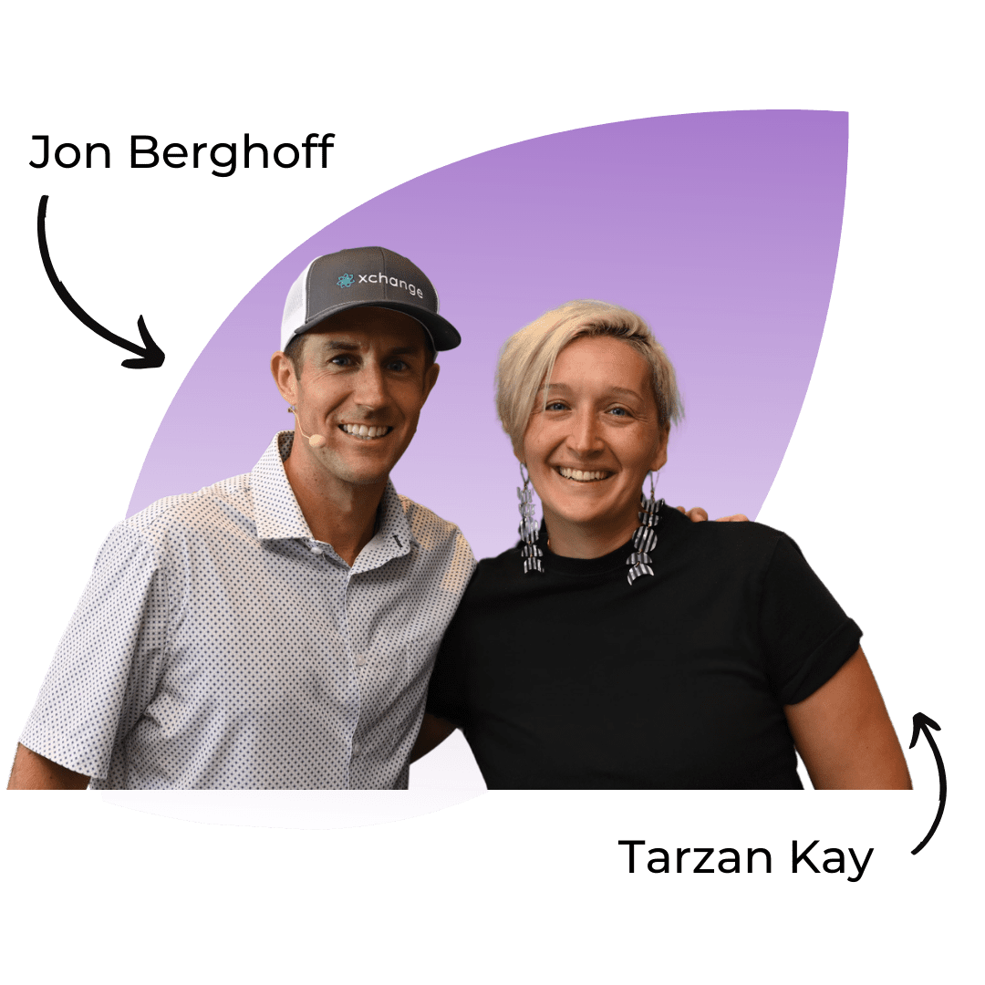 Two people stand side by side smiling. The person on the left wears a patterned shirt and a cap labeled "xchange," with text above reading "Jon Berghoff." The person on the right wears a black shirt, labeled "Tarzan Kay.